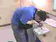 Me working on my radio for electronics class.